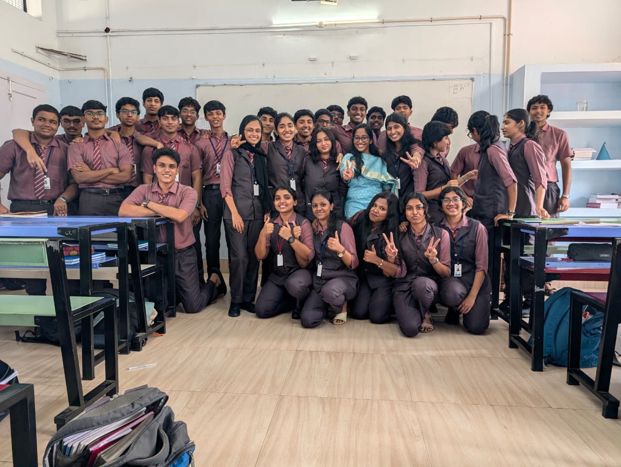 Karthika Miss with her students in their classroom